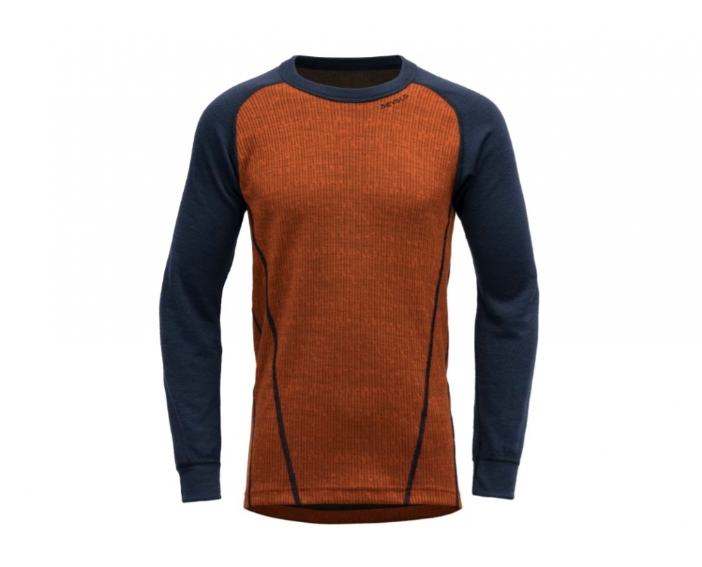 Gi barna en optimal kombinasjon av komfort og funksjonalitet med Devold Duo Active Merino Shirt for junior. Den er laget av en innovativ blanding av merinoull og polyester, som gir både varme og fukttransport, perfekt for aktive små eventyrere.