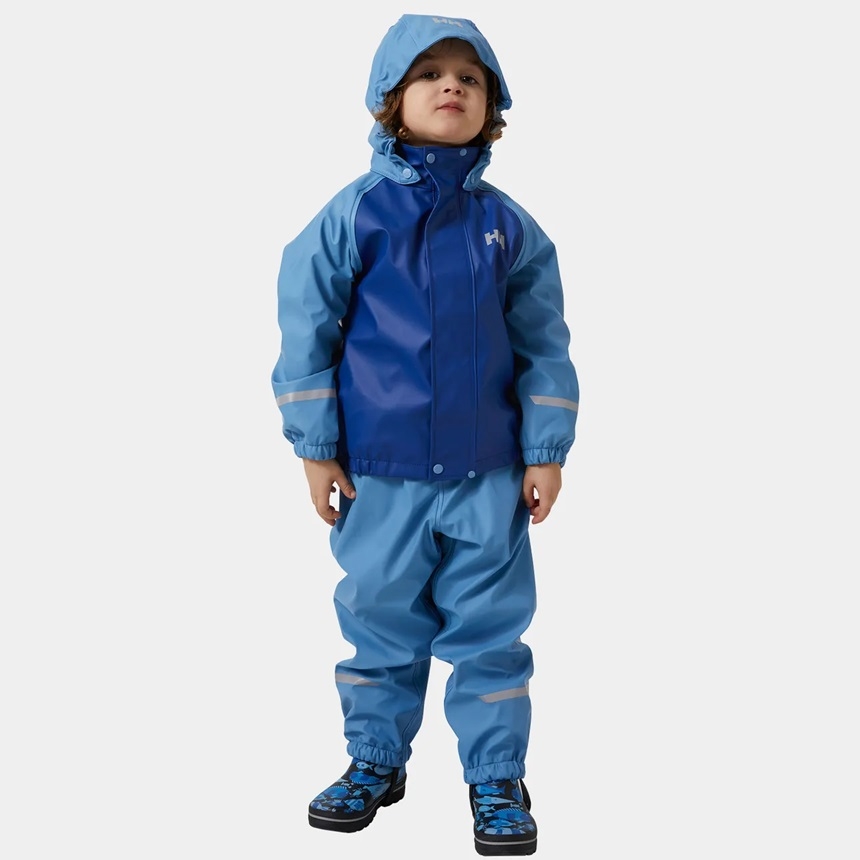 Helly Hansen Bergen Fleece Rain Set 2.0 er et komfortabelt og robust regnsett for barn, perfekt for våte og kjølige dager. Med et vanntett og vindtett ytterlag i Helox+®-teknologi og et mykt fleecefôr, holder det barna tørre og varme i all slags vær.